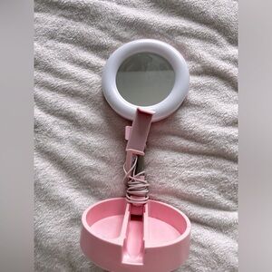 Light up Pink round mirror with phone holder